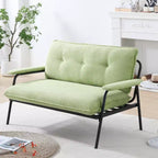 Canapé vert de 76 cm, idéal pour diverses configurations d'appartements, salons et chambres.